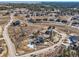 Gorgeous aerial view of a neighborhood with picturesque houses, and beautiful natural landscaping at 5820 Powell Rd, Parker, CO 80134