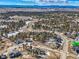 Wide aerial perspective showcasing the community's layout and serene, wooded surroundings at 5820 Powell Rd, Parker, CO 80134