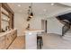 Finished basement bar with custom cabinetry and lighting at 5820 Powell Rd, Parker, CO 80134