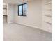 Finished basement bedroom with built-in shelving and closet at 5820 Powell Rd, Parker, CO 80134