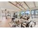 Light-filled living room with open floor plan and views of the backyard at 5820 Powell Rd, Parker, CO 80134