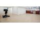 Finished basement with wood floors, entertainment space, and a kitchenette at 4994 S Independence Way, Littleton, CO 80123