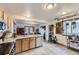 Bright kitchen with stainless steel appliances, and a large island, perfect for entertaining at 17076 Foxton Dr, Parker, CO 80134