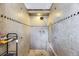 Modern tiled shower with rain showerhead, mosaic accent tiles, and glass enclosure at 17076 Foxton Dr, Parker, CO 80134