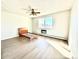 Bright bedroom showcasing ample space and a large window for natural light at 755 S Alton Way # 12C, Denver, CO 80247