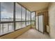 Enclosed balcony with large windows and views of the surrounding area at 13902 E Marina Dr # 412, Aurora, CO 80014