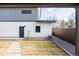 Well-maintained backyard with stone pathway leading to the back entrance of the house and modern landscaping at 2720 N Saint Paul St, Denver, CO 80205