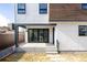Backyard patio with folding glass doors leading to the interior of the home, providing a seamless transition at 2720 N Saint Paul St, Denver, CO 80205