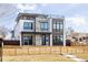 Striking modern home boasting unique architectural design, sleek lines, and inviting curb appeal at 2720 N Saint Paul St, Denver, CO 80205