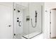 Contemporary shower with glass enclosure, bench, and modern fixtures, offering a spa-like experience at 2720 N Saint Paul St, Denver, CO 80205