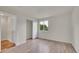 Bedroom with wood floor, window and sliding door closet at 11091 Clayton St, Northglenn, CO 80233