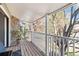 This balcony features wood floors and a beautiful view of the trees at 18391 E Kepner Pl # 205, Aurora, CO 80017