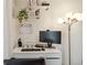 Dedicated workspace with a modern desk setup and plenty of natural light at 18391 E Kepner Pl # 205, Aurora, CO 80017