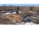 Aerial view of house and neighborhood with mountain views at 2753 S Meade St, Denver, CO 80236