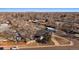 Wide aerial view of house and neighborhood, showcasing street and surrounding homes at 2753 S Meade St, Denver, CO 80236