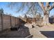 Backyard patio with fire pit and modern seating at 2753 S Meade St, Denver, CO 80236