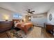 Main bedroom with mid century modern furniture and hardwood floors at 2753 S Meade St, Denver, CO 80236