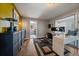 Bright home office with built-in shelving and hardwood floors at 2753 S Meade St, Denver, CO 80236