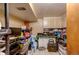 View of the basement with cabinets, storage and desk area at 233 Nome St, Aurora, CO 80010