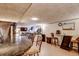 Basement area featuring a spacious bar with seating and a relaxed atmosphere at 233 Nome St, Aurora, CO 80010