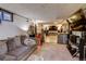 Basement with carpet and a TV that is part of a Gathering entertainment area at 233 Nome St, Aurora, CO 80010