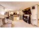 Finished basement lounge space includes a wet bar, lounge area, and entertainment setup at 233 Nome St, Aurora, CO 80010