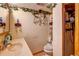 Cozy bathroom featuring a shower and vanity with tasteful décor at 233 Nome St, Aurora, CO 80010