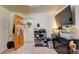 A secondary bedroom with a variety of decor and storage for shoes and personal items at 233 Nome St, Aurora, CO 80010