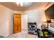 Bedroom with a shoe rack, and an adjacent room view at 233 Nome St, Aurora, CO 80010