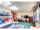 Bonus Room with bunk beds, natural light and an exterior door at 233 Nome St, Aurora, CO 80010