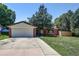 Well-maintained brick home with a spacious driveway at 233 Nome St, Aurora, CO 80010