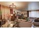 Open concept living and dining area featuring stylish decor and cozy furniture at 233 Nome St, Aurora, CO 80010