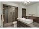 Contemporary bathroom featuring a glass shower, modern vanity, and sophisticated finishes at 460 S Marion Pkwy # 706, Denver, CO 80209