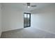 Bright bedroom featuring carpet flooring, and slider to the balcony for natural light at 460 S Marion Pkwy # 706, Denver, CO 80209