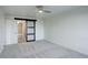 Bedroom featuring carpet and bathroom access with barn door at 460 S Marion Pkwy # 706, Denver, CO 80209