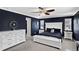 Elegant main bedroom boasts with a calming color palette, lots of natural light, and a sleek ceiling fan at 4649 Spinning Wheel Dr, Brighton, CO 80601
