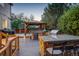 This deck features an outdoor kitchen and bar area, perfect for grilling and entertaining guests at 4649 Spinning Wheel Dr, Brighton, CO 80601
