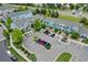 Aerial view of the property showcasing nearby parking and townhome units at 19249 E 58Th Ave # D, Denver, CO 80249