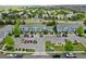 Aerial view of the property showcasing nearby parking and townhome units at 19249 E 58Th Ave # D, Denver, CO 80249