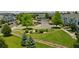 Aerial view of the property showcasing a well-landscaped community and convenient parking at 19249 E 58Th Ave # D, Denver, CO 80249