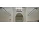Bathroom with modern lighting and oval mirror at 19249 E 58Th Ave # D, Denver, CO 80249