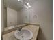 Bathroom featuring a large vanity, sink, mirror, and lighting at 19249 E 58Th Ave # D, Denver, CO 80249