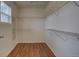 Walk-in closet with custom shelving at 19249 E 58Th Ave # D, Denver, CO 80249