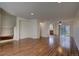 Bright living room featuring wood flooring and recessed lighting at 19249 E 58Th Ave # D, Denver, CO 80249
