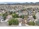 Aerial view of a community with mature trees at 5461 S Youngfield Ct, Littleton, CO 80127