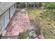 Spacious backyard featuring a brick patio, lush lawn, perfect for outdoor entertaining at 5461 S Youngfield Ct, Littleton, CO 80127