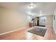 Spacious basement room with laminate flooring, neutral walls, and versatile layout for various uses at 5461 S Youngfield Ct, Littleton, CO 80127