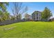 Spacious backyard, perfect for outdoor activities and entertaining, with wood fence at 1716 W Sunset St, Longmont, CO 80501