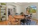 Bright dining room featuring lovely hardwood floors, a modern light and elegant accents at 670 Independence Dr, Larkspur, CO 80118