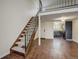 View of the stairs, entryway, and kitchen from the living room at 218 Wright St # 303, Lakewood, CO 80228